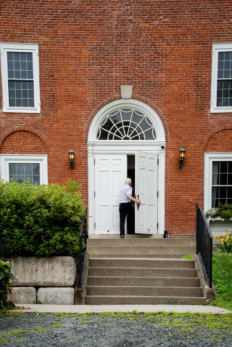 Person entering The Etna Church